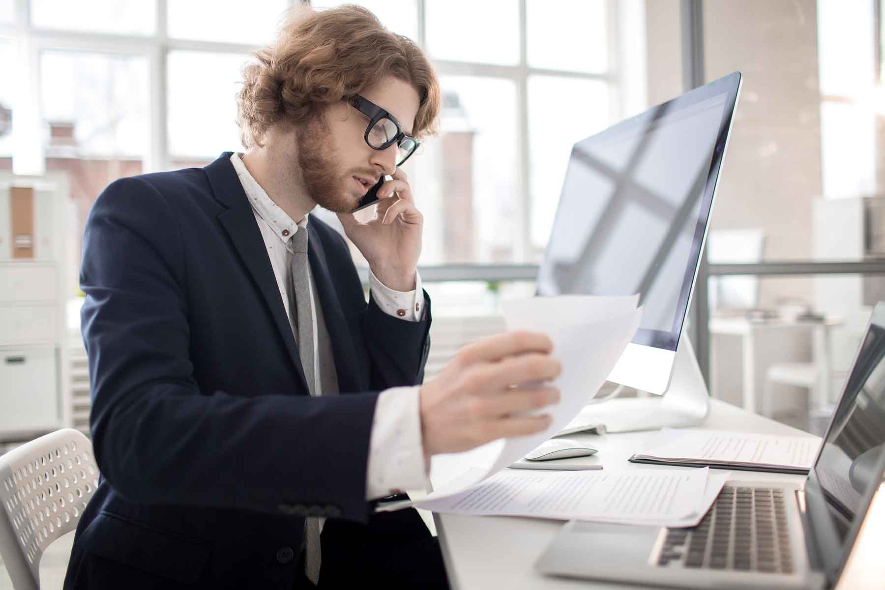 Office worker using computer equipment