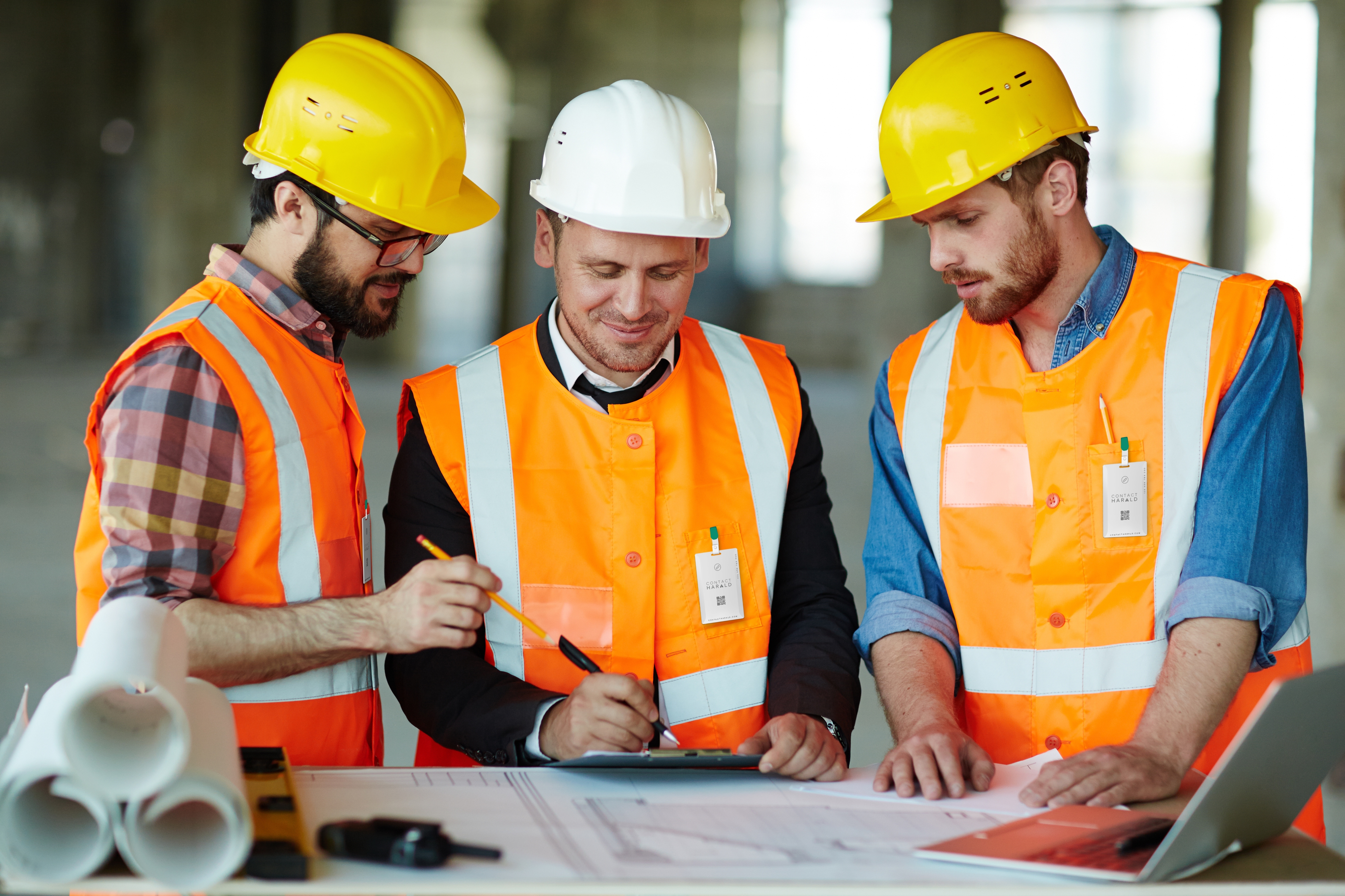 Construction team planning project funded by SBA loan