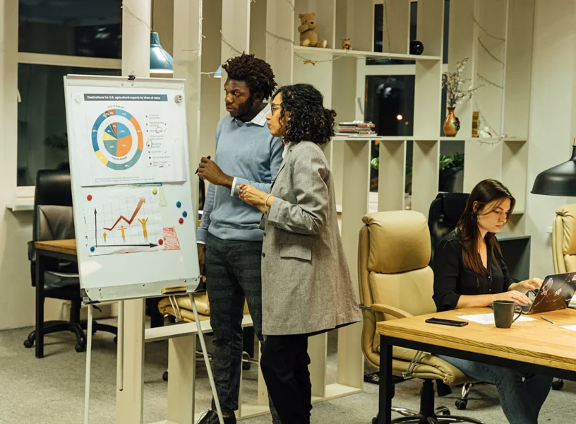 Diverse business team collaborating, representing growth via SBA Express loans