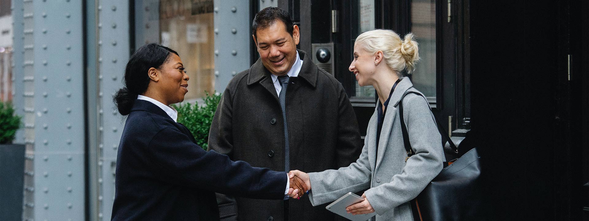 Global handshake symbolizing international real estate investment